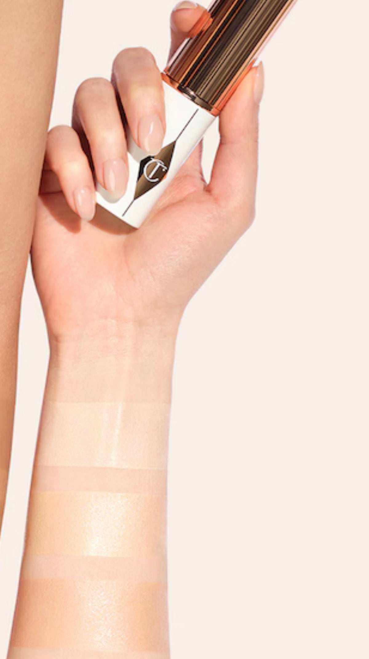 CHARLOTTE TILBURY Unreal Skin Sheer Glow Tint - Stick Fond de teint Hydratant