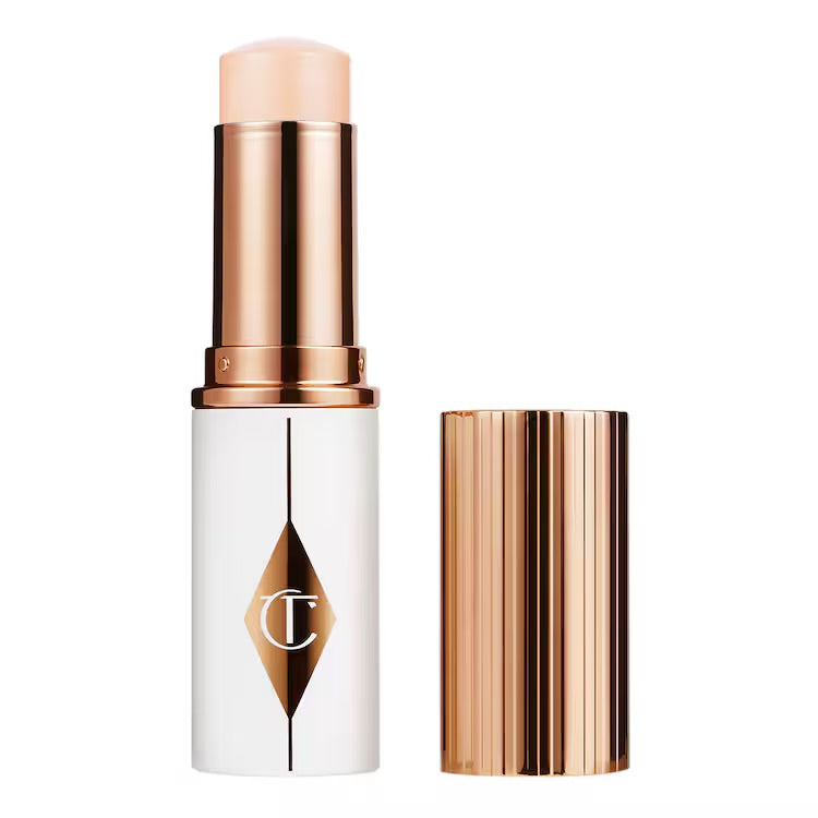 CHARLOTTE TILBURY Unreal Skin Sheer Glow Tint - Stick Fond de teint Hydratant