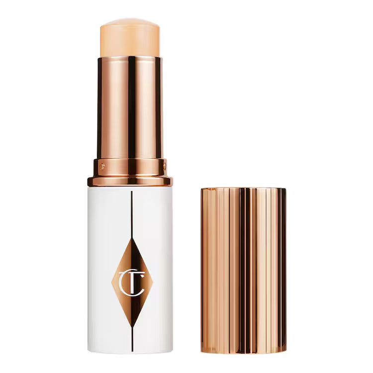 CHARLOTTE TILBURY Unreal Skin Sheer Glow Tint - Stick Fond de teint Hydratant